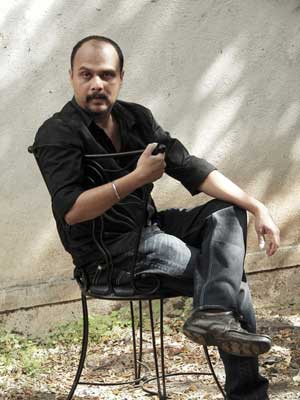 Portrait of Devidas Dharmadhikari, leading contemporary horse painting artist in Pune, India